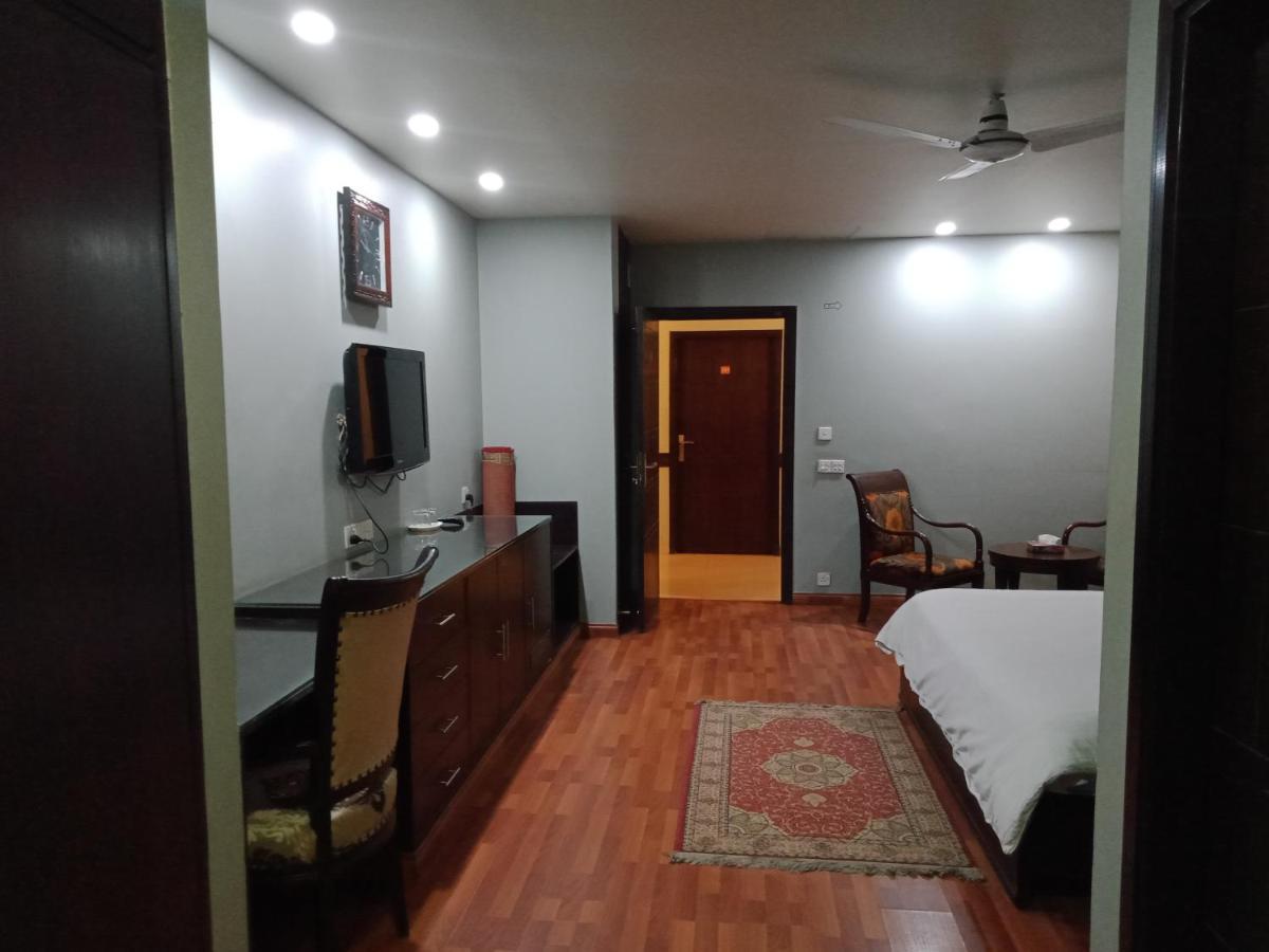 Hira Guest House Карачи Экстерьер фото
