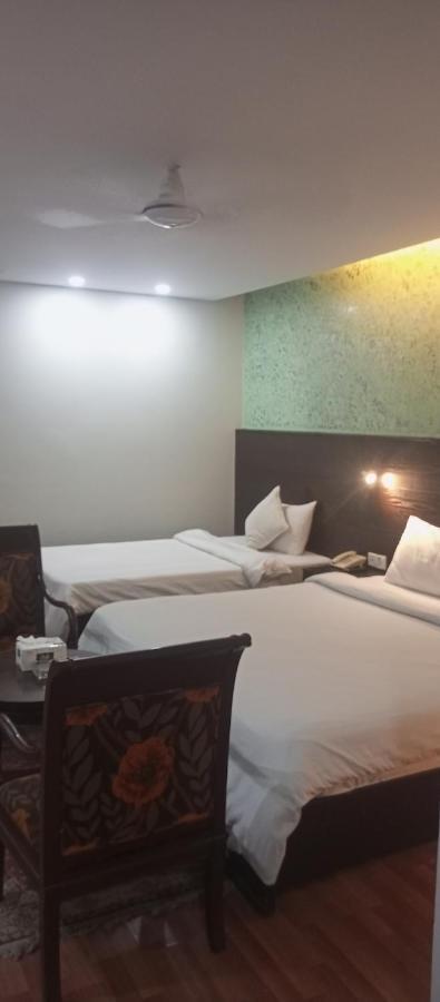 Hira Guest House Карачи Экстерьер фото